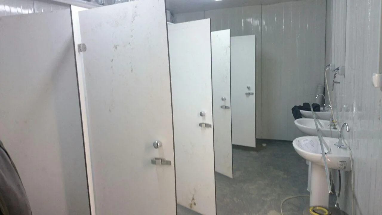 Sanitary plumbing fixtures installed in a temporary modular washroom