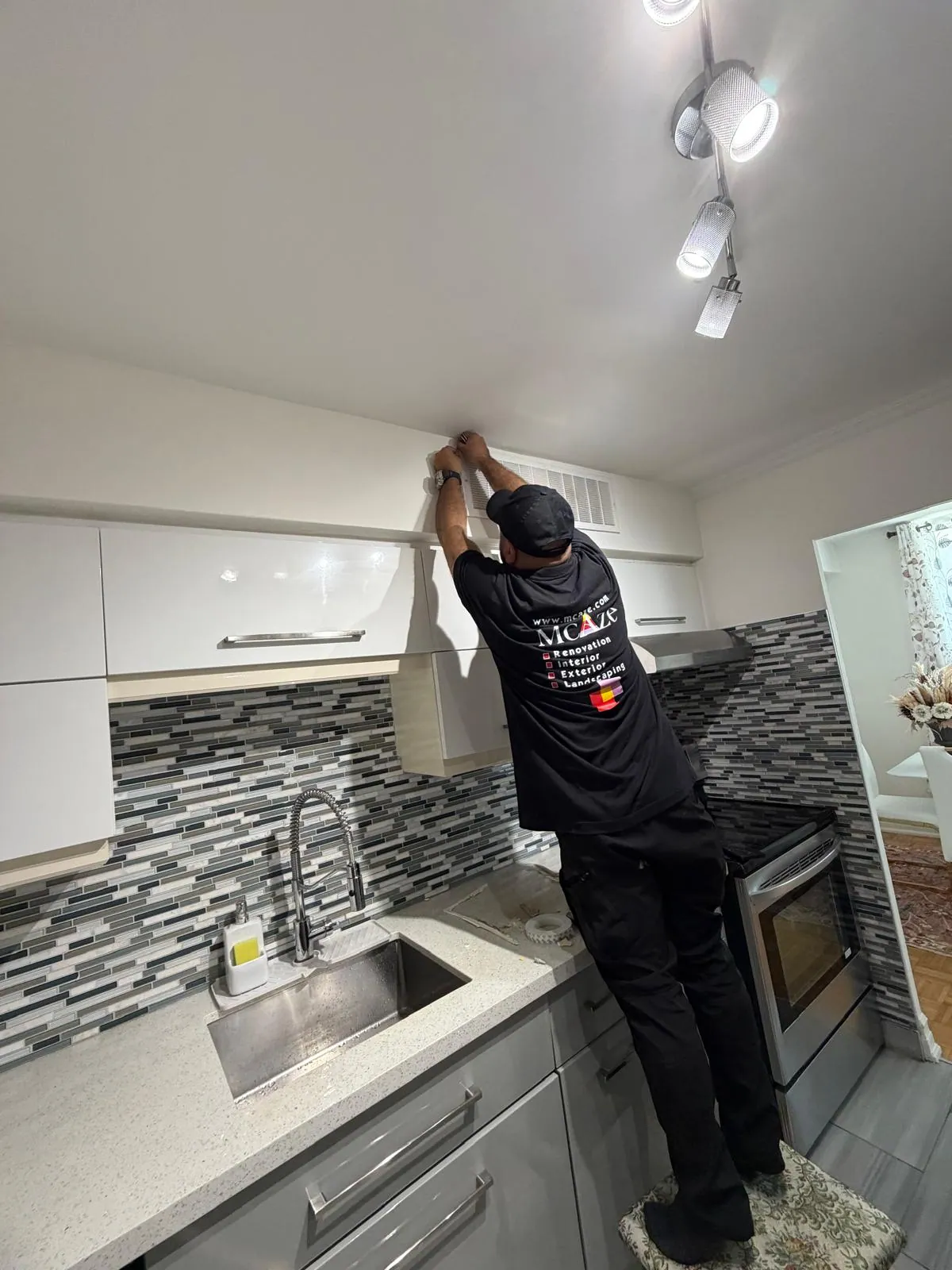 McAze completing kitchen cabinet finishing in a North York condo