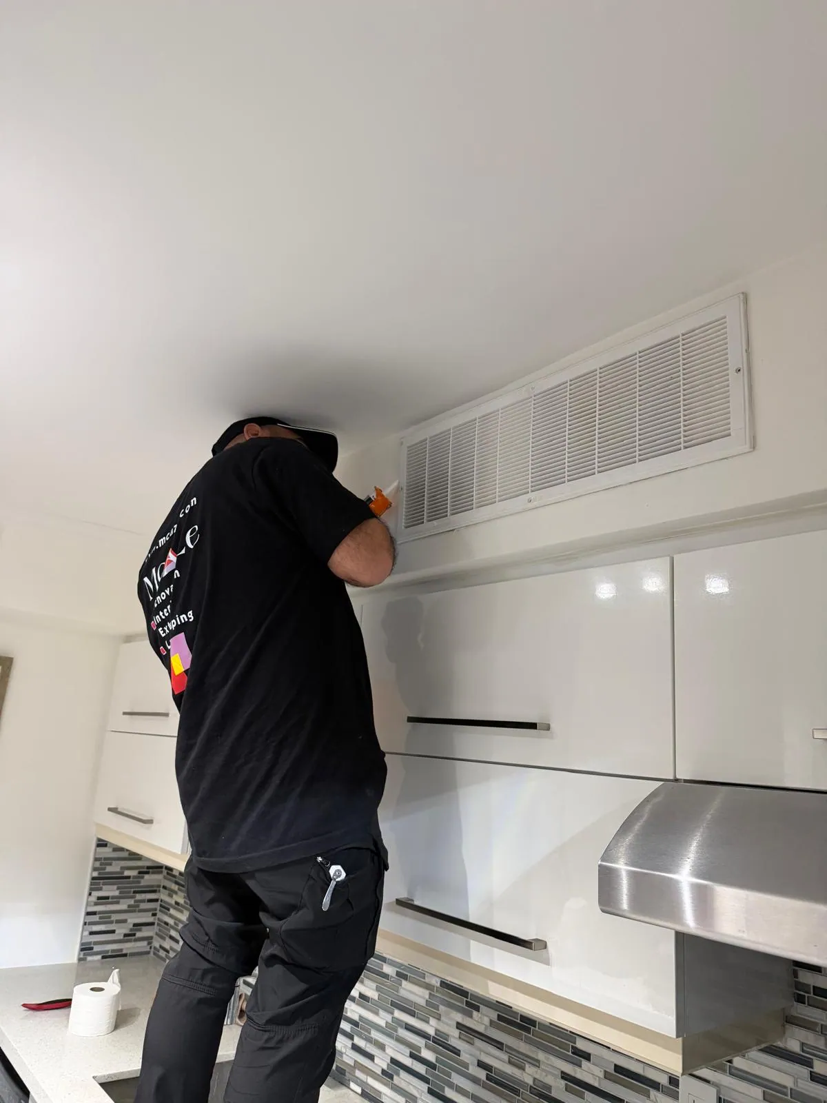 Kitchen ventilation grille finishing in renovated North York condo