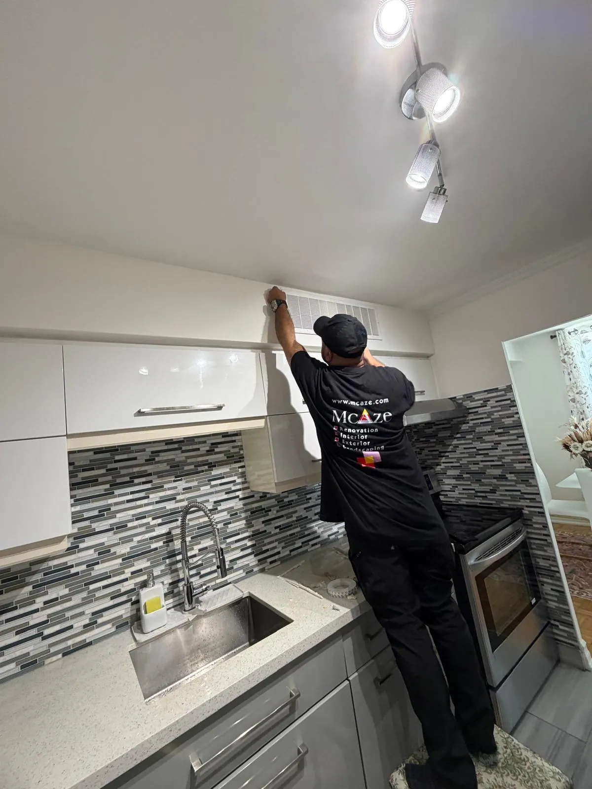McAze completing final details in a renovated North York condo kitchen