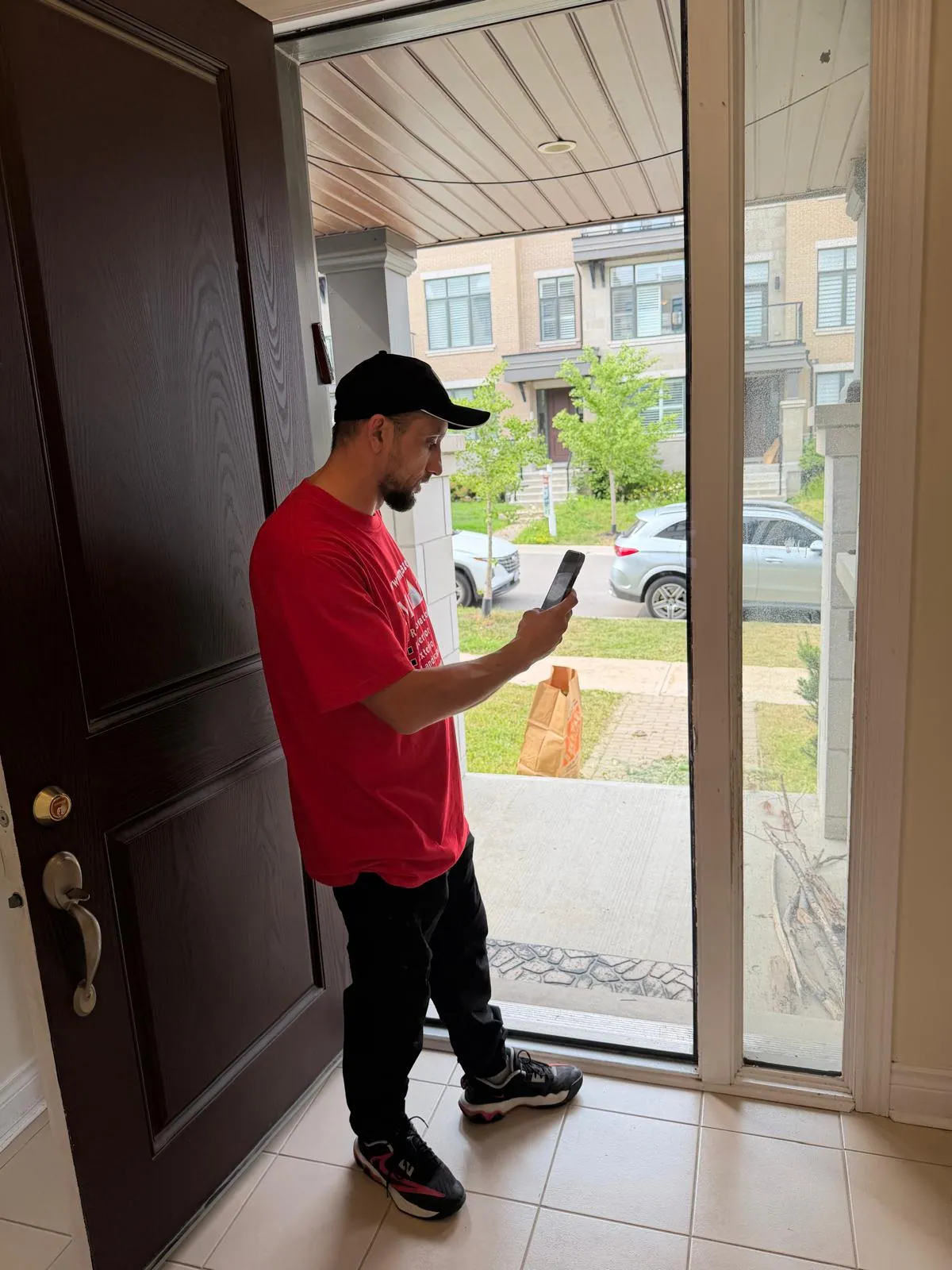 Entrance door inspection during Thornhill townhouse renovation