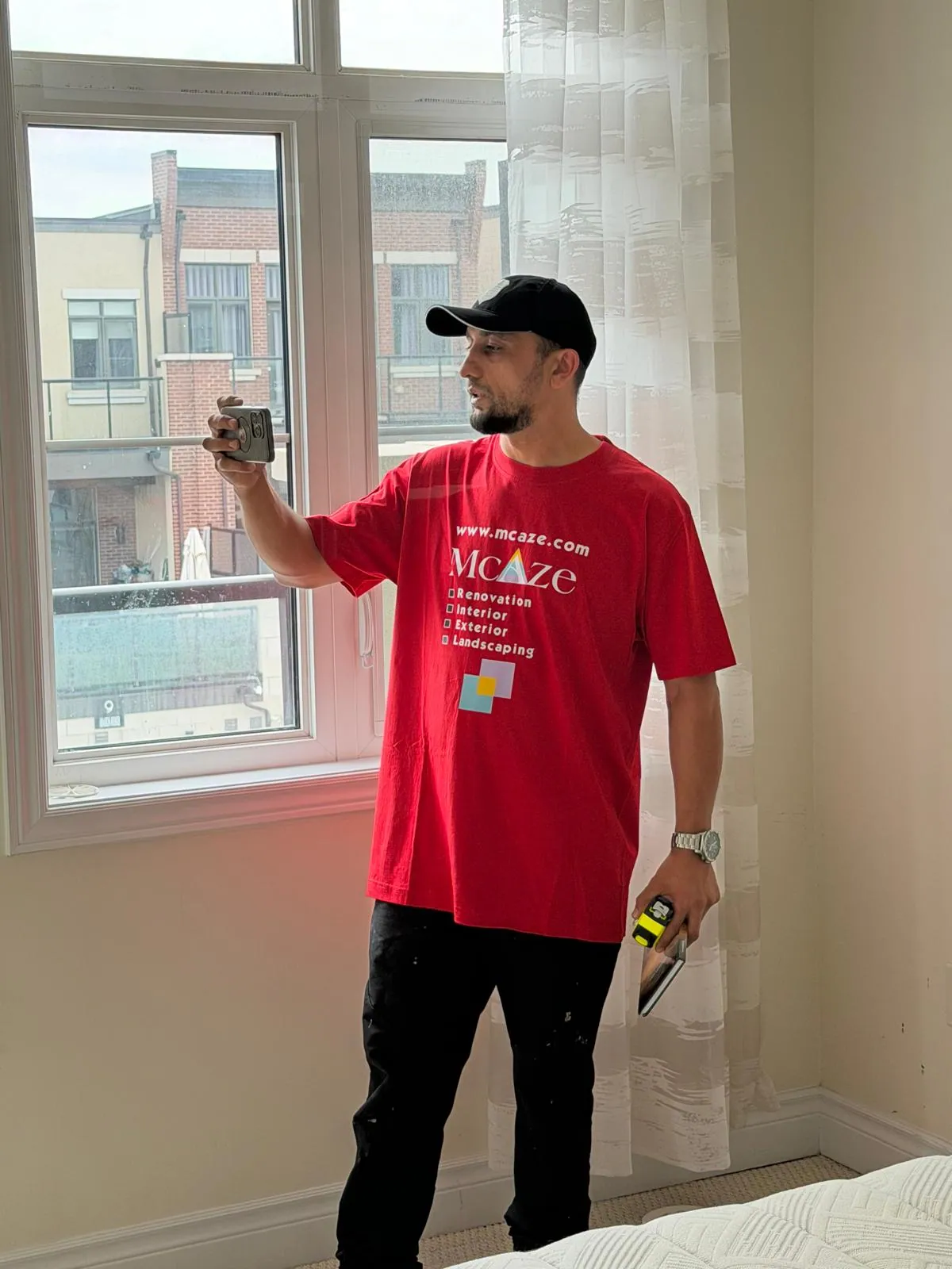 McAze contractor inspecting townhouse windows in Thornhill