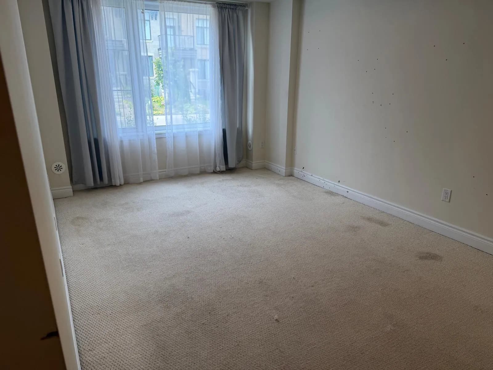 Worn carpet before three-storey townhouse renovation in Thornhill