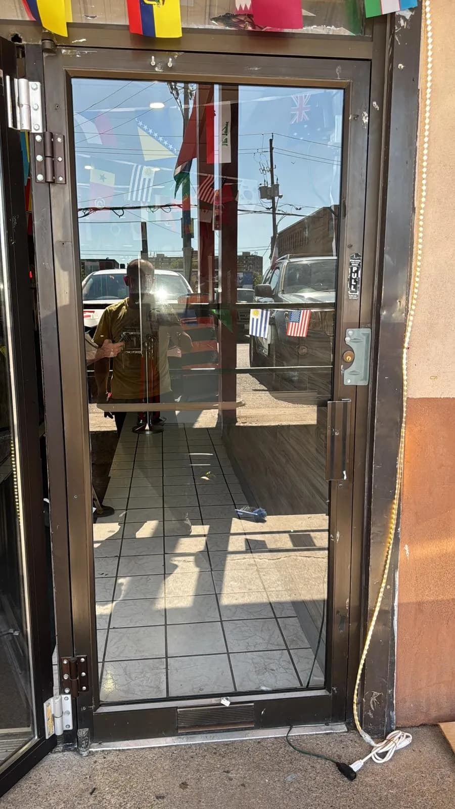 Completed commercial glass entrance door replacement in Mississauga, Ontario