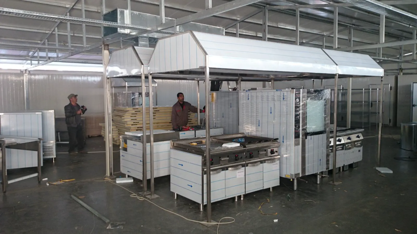 Commercial fast food kitchen equipment and exhaust hood installation in Woodbridge, Ontario